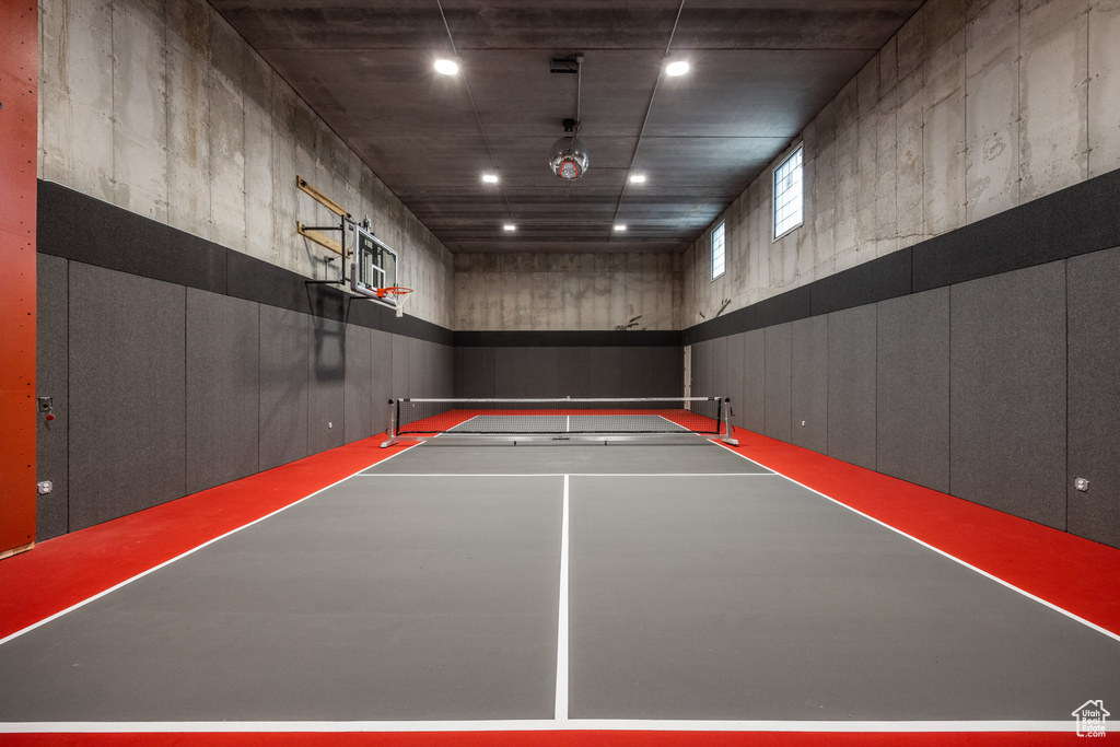 View of tennis court featuring community basketball court