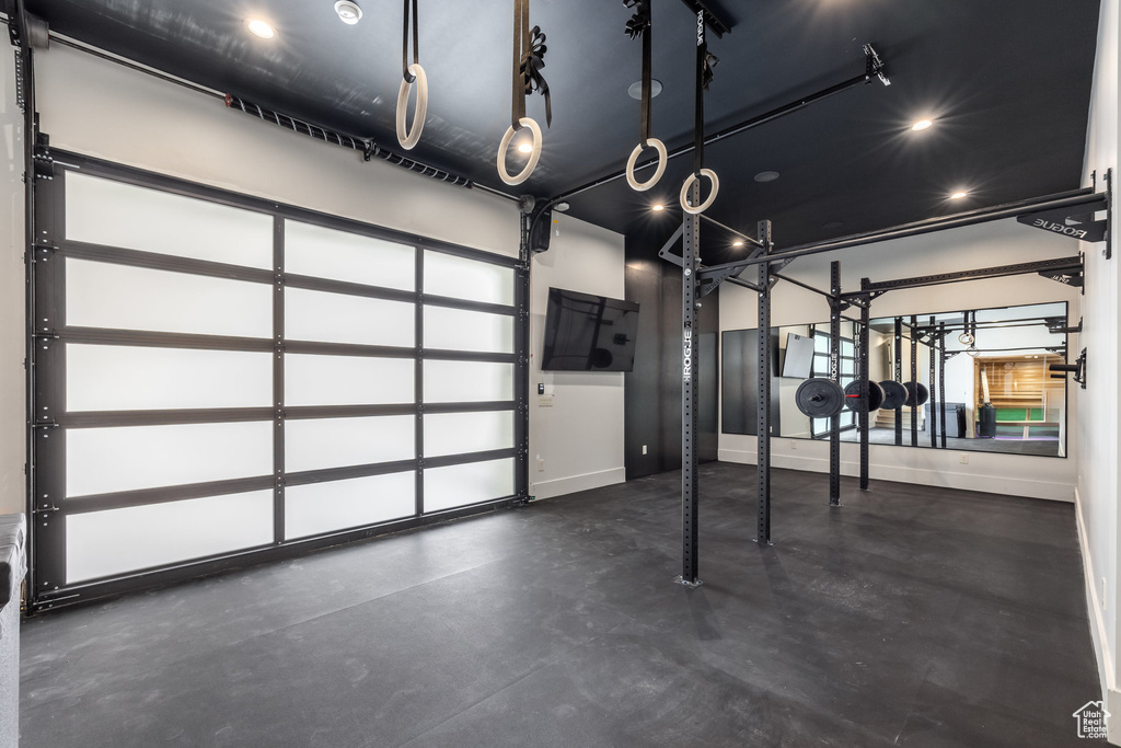 Garage featuring baseboards