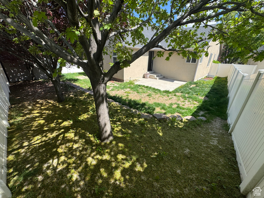 View of yard featuring a fenced backyard