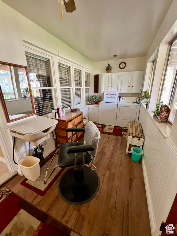 Sunroom / solarium featuring washer and dryer