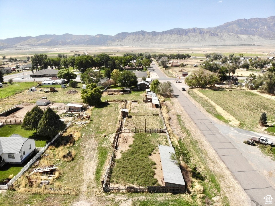 Drone / aerial view with a mountain view and a rural view