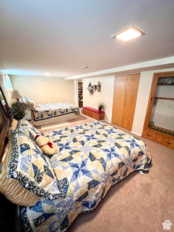 Bedroom with carpet flooring