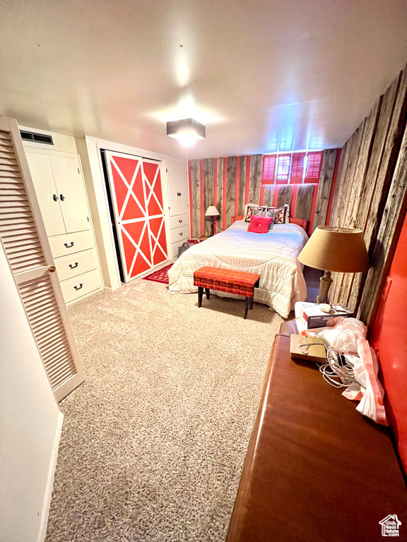 Carpeted bedroom with visible vents