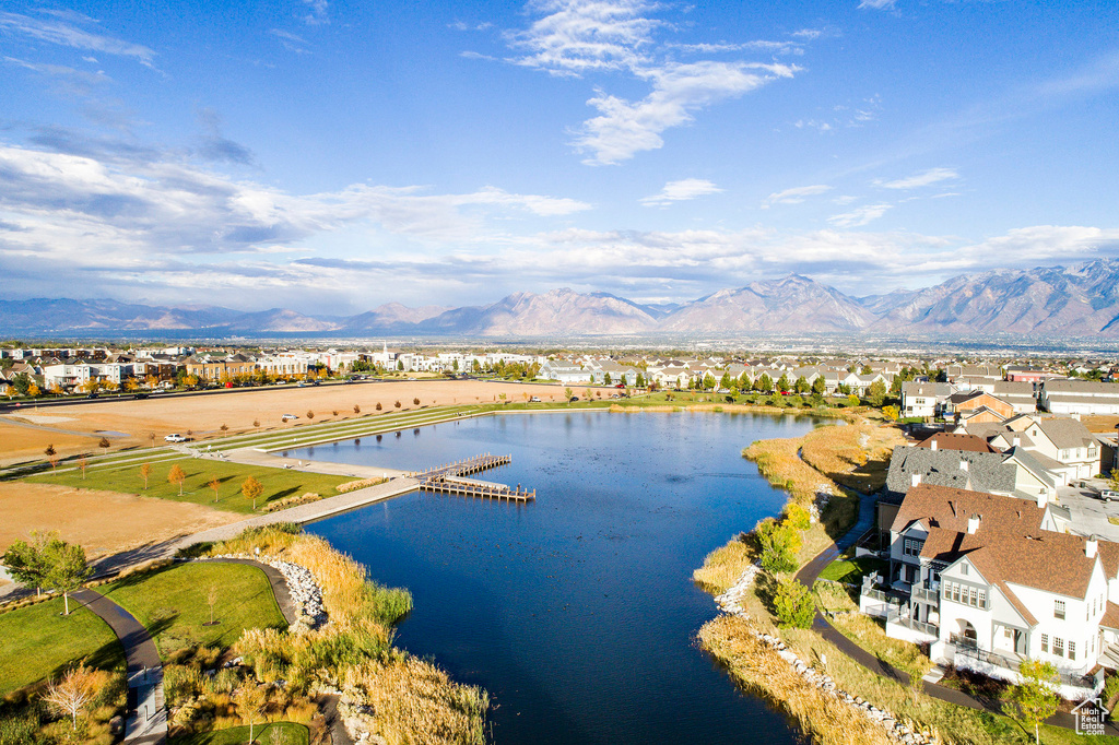 Aerial view featuring a water and mountain view