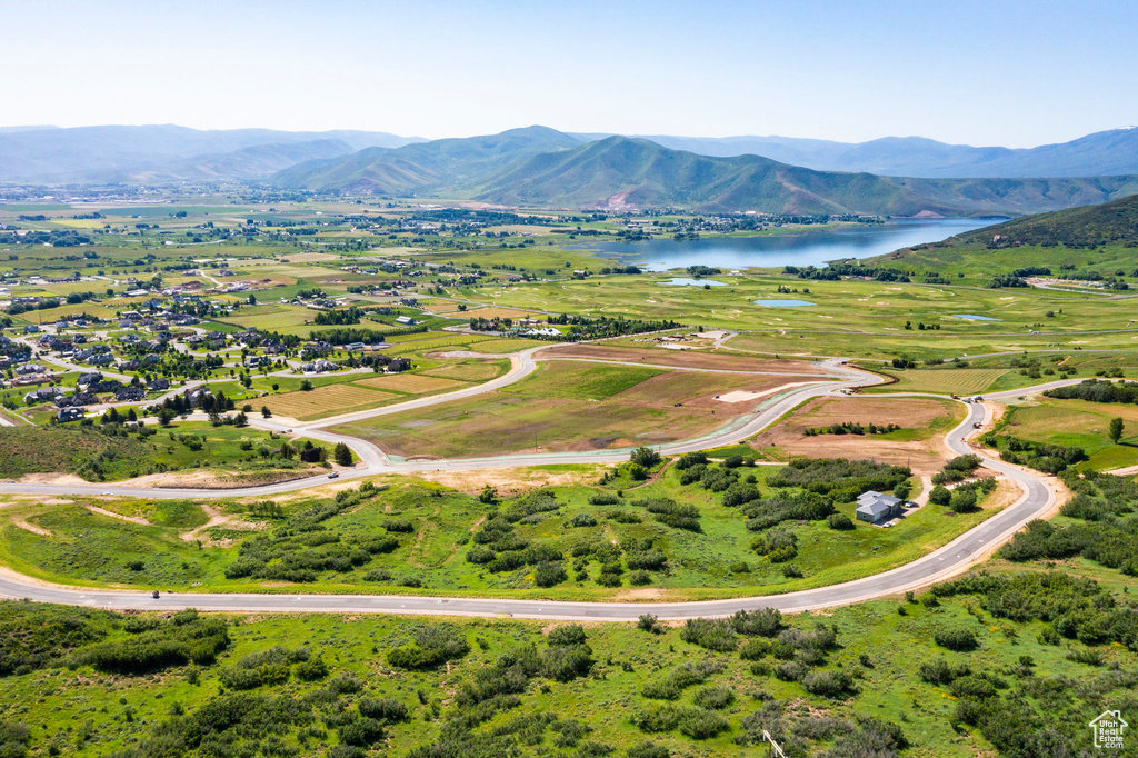 Bird's eye view featuring a water and mountain view