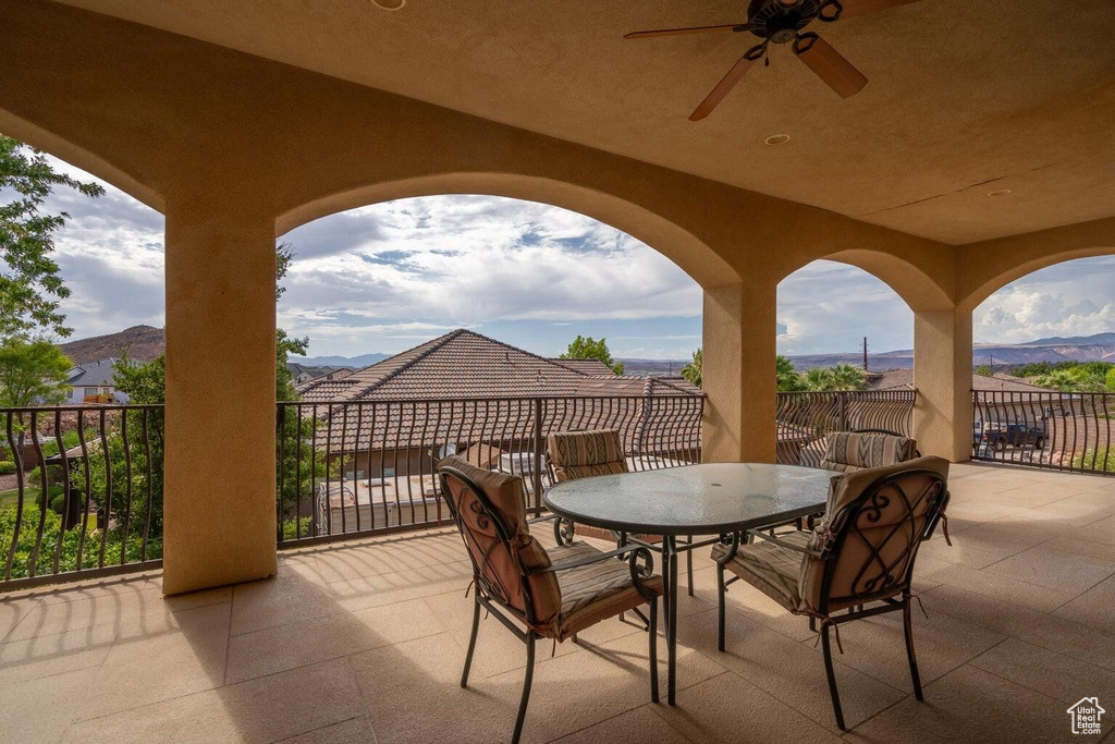 View of patio / terrace featuring a mountain view and outdoor dining space