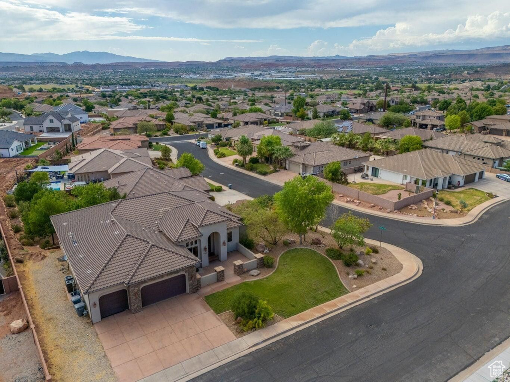 Drone / aerial view featuring a mountain view and a residential view