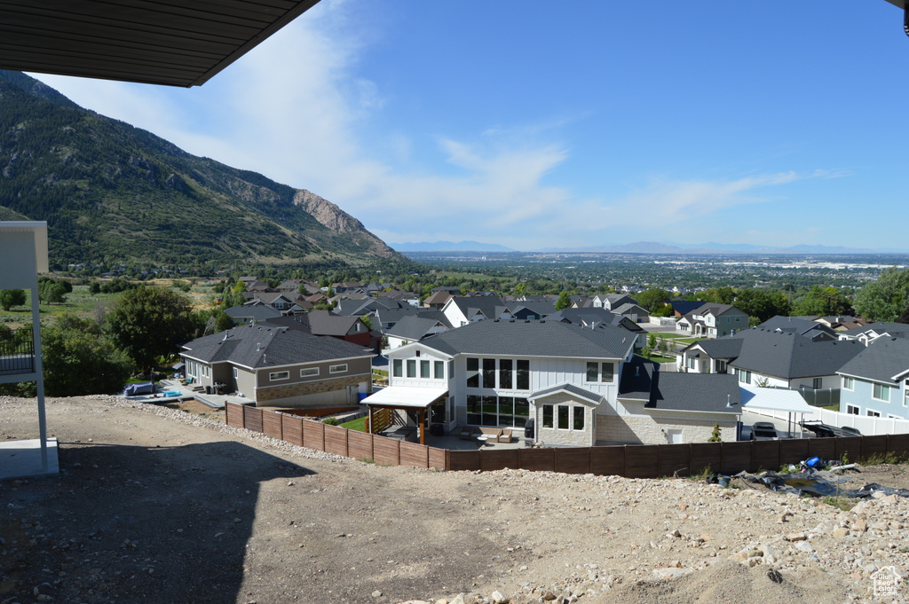 View of mountain background featuring nearby suburban area