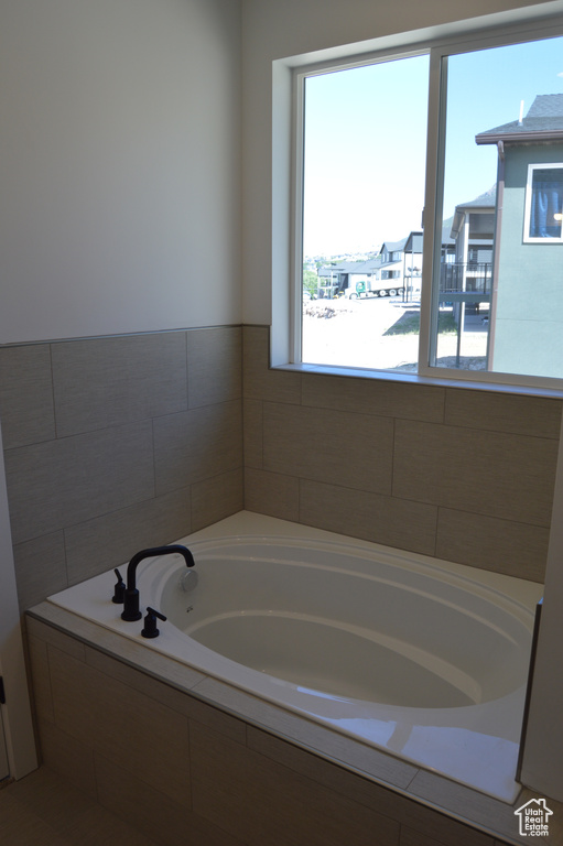 Full bathroom with a garden tub