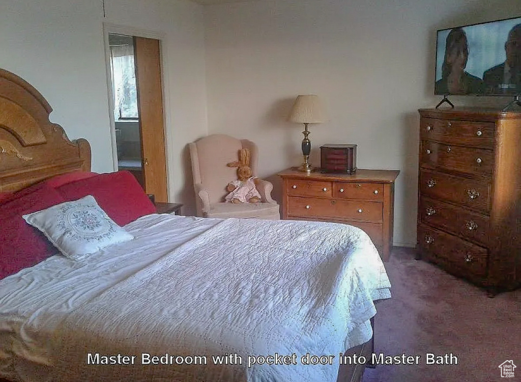 Bedroom featuring carpet flooring