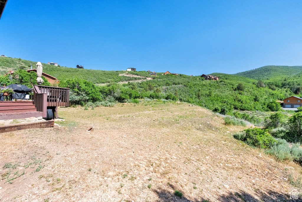 View of yard featuring a deck