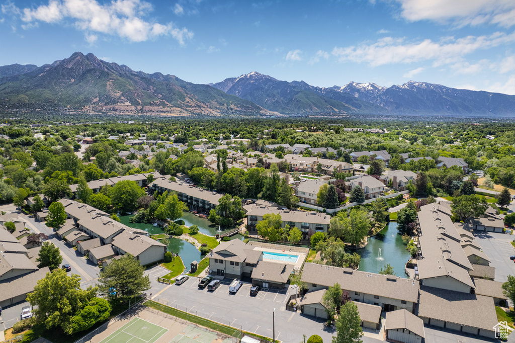 Aerial view of residential area featuring a water and mountain view