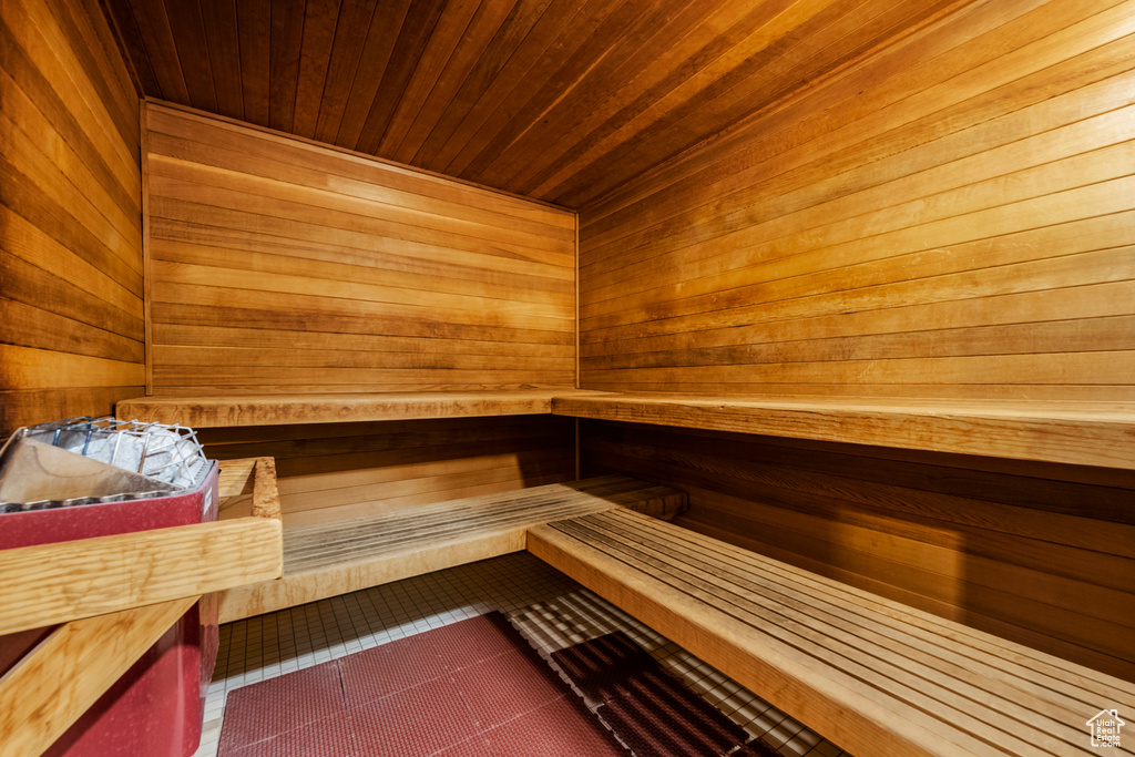 View of sauna / steam room with tile patterned flooring