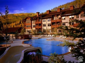 View of pool with a water slide