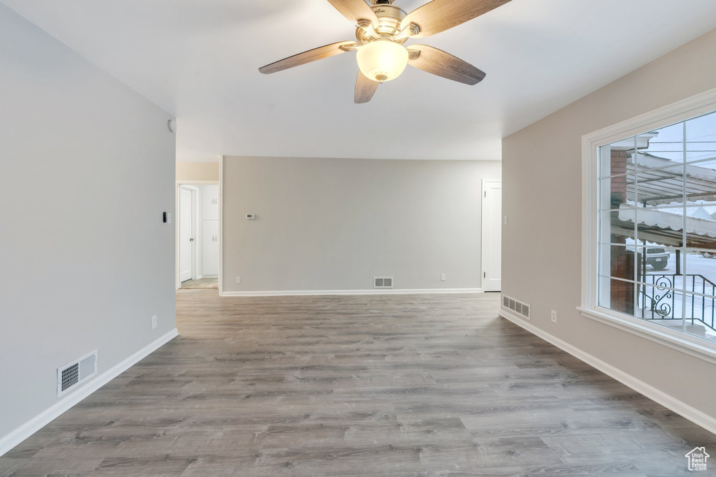 Spare room featuring baseboards and visible vents