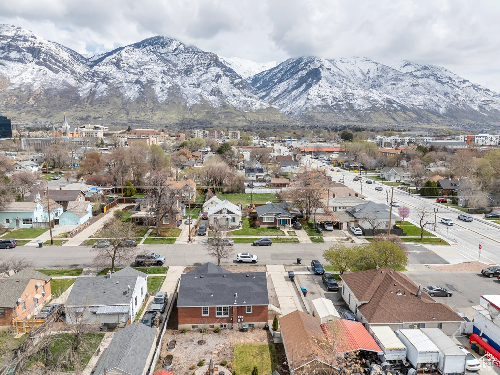 Aerial view featuring a mountain view and a residential view