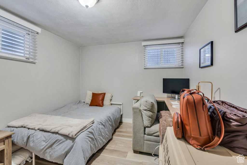 Bedroom featuring light wood-style flooring