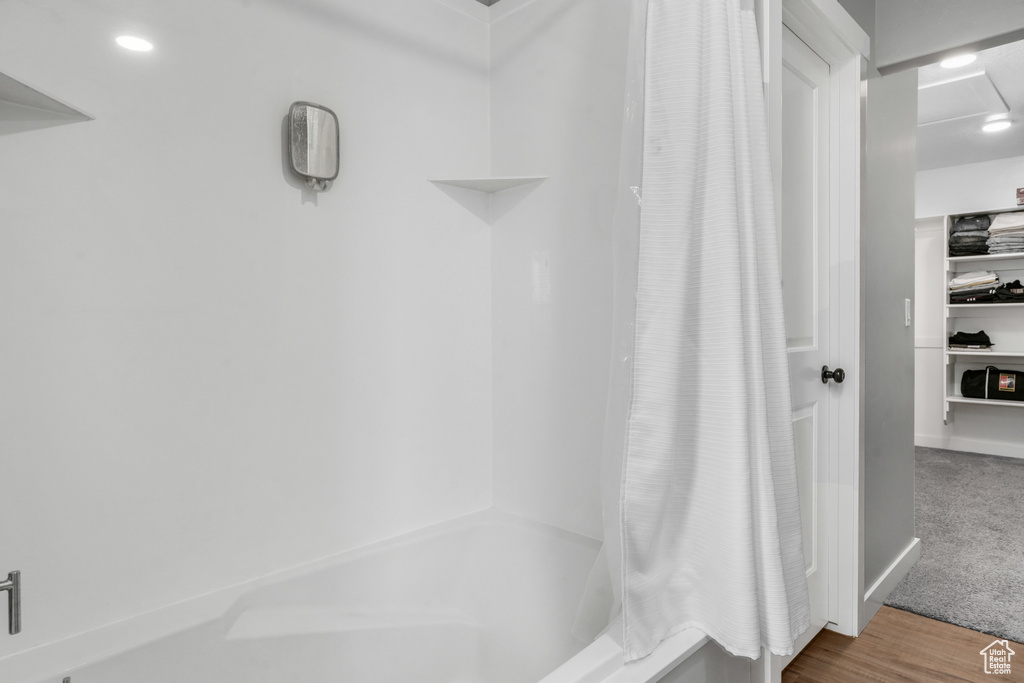 Bathroom with wood finished floors