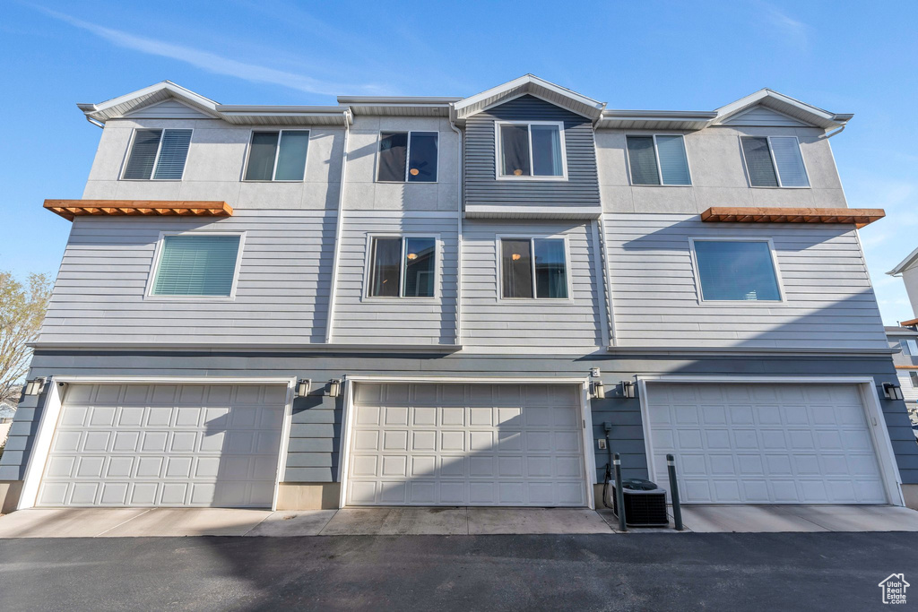 Multi unit property with cooling unit and a garage
