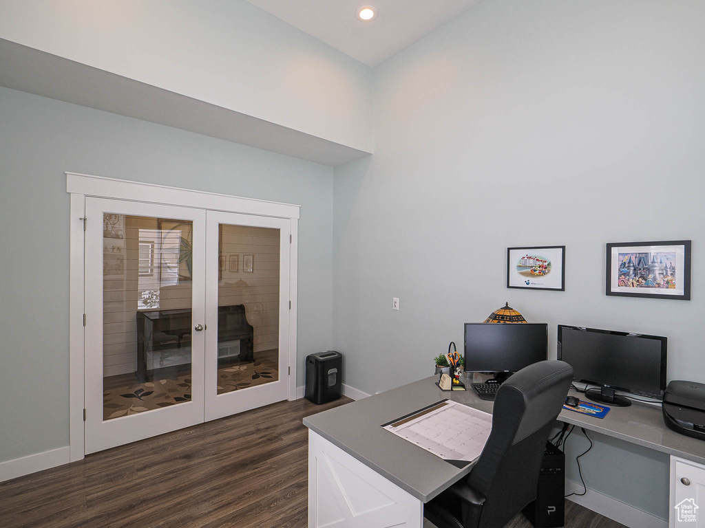 Office featuring dark wood-style floors, recessed lighting, french doors, and baseboards