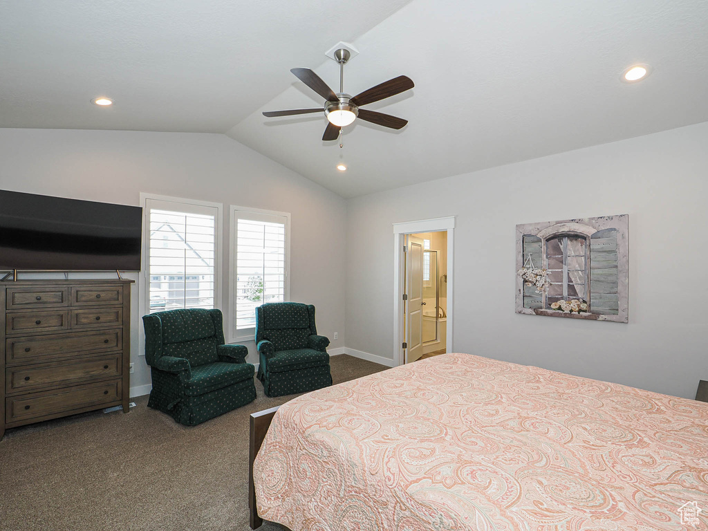 Bedroom with baseboards, lofted ceiling, recessed lighting, and dark colored carpet
