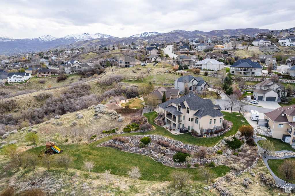 Aerial view featuring a mountain view and a residential view