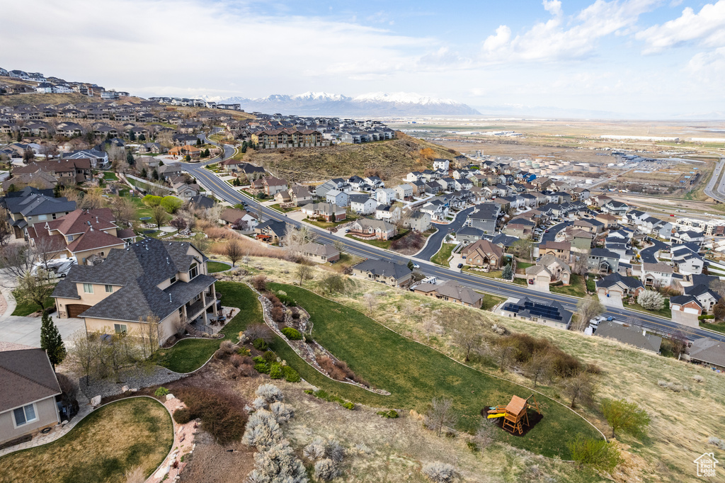 Birds eye view of property with a residential view