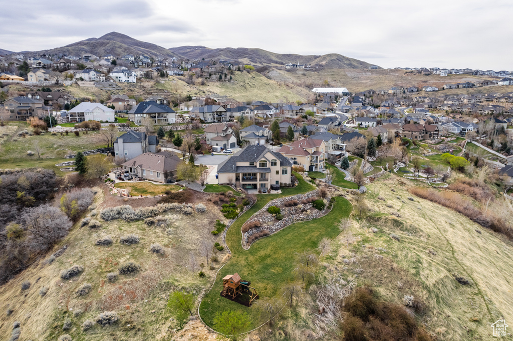 Aerial view featuring a mountain view and a residential view