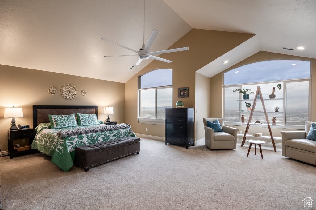 Bedroom featuring high vaulted ceiling, carpet flooring, baseboards, visible vents, and ceiling fan