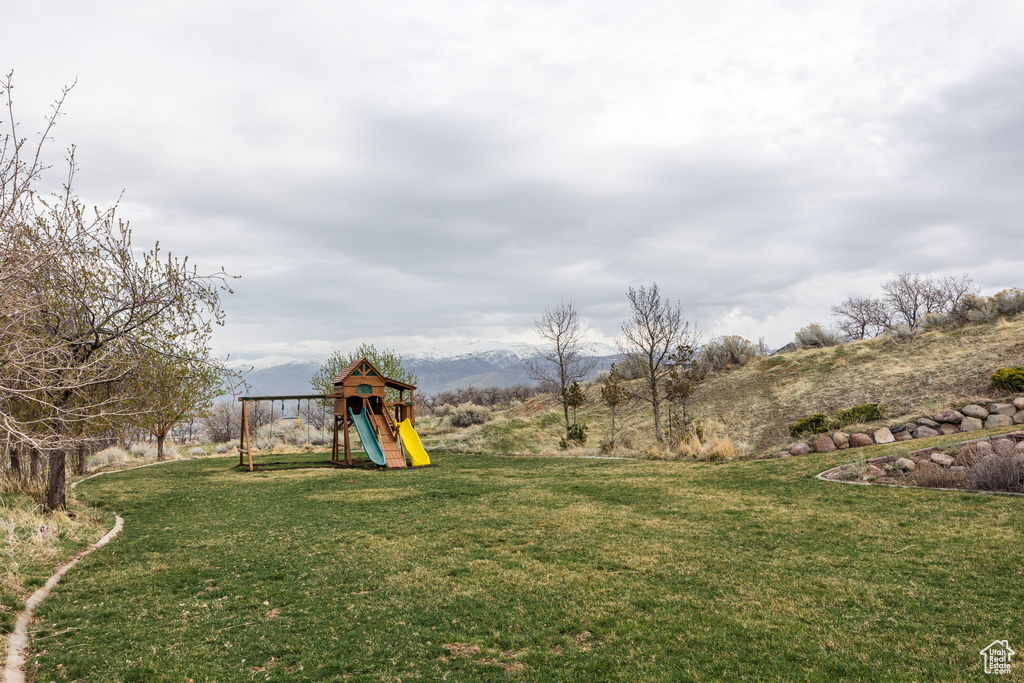 View of yard with a playground