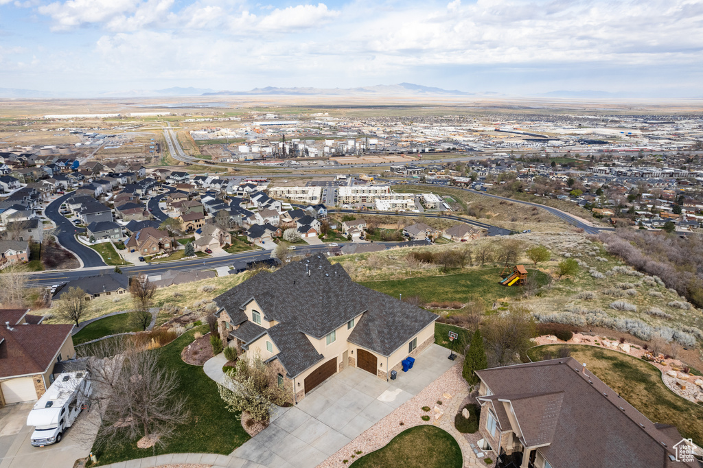 Drone / aerial view featuring a mountain view and a residential view