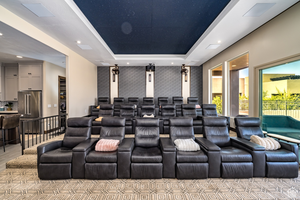 Home theater featuring wallpapered walls and recessed lighting