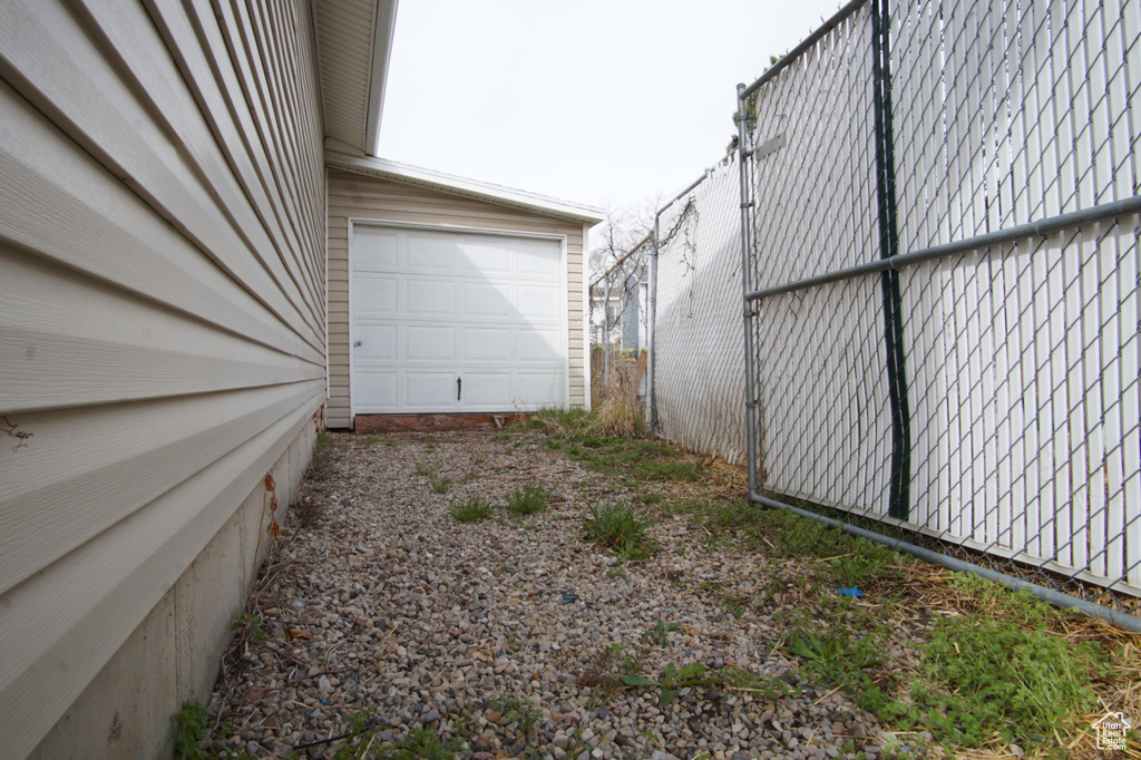 View of yard featuring a garage