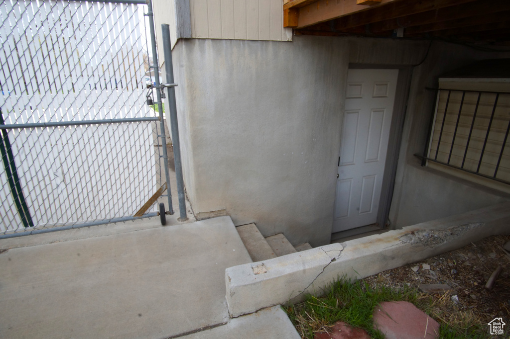 Exterior space featuring stucco siding