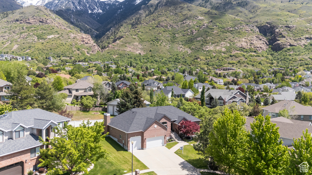 Aerial view of residential area with a mountain backdrop