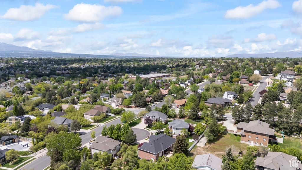Aerial view of residential area with mountains