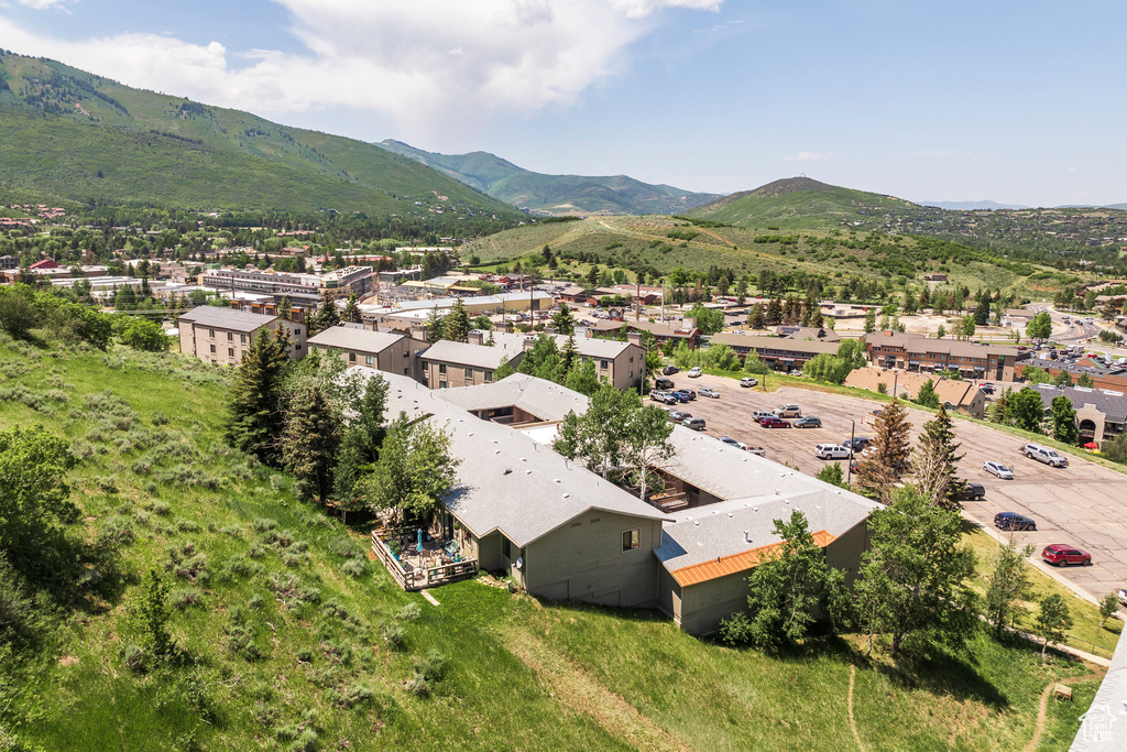 Aerial view of residential area featuring a mountain backdrop