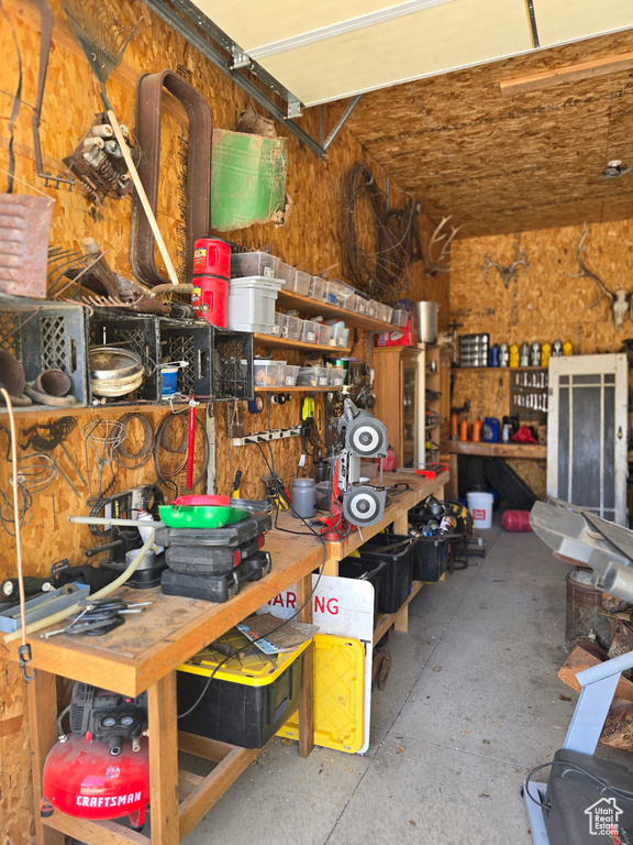 Garage featuring a workshop area