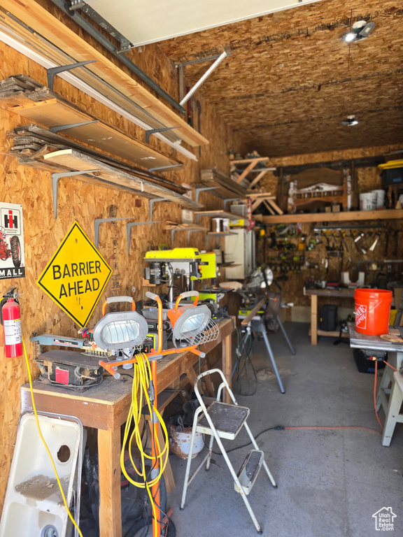 Garage featuring a workshop area