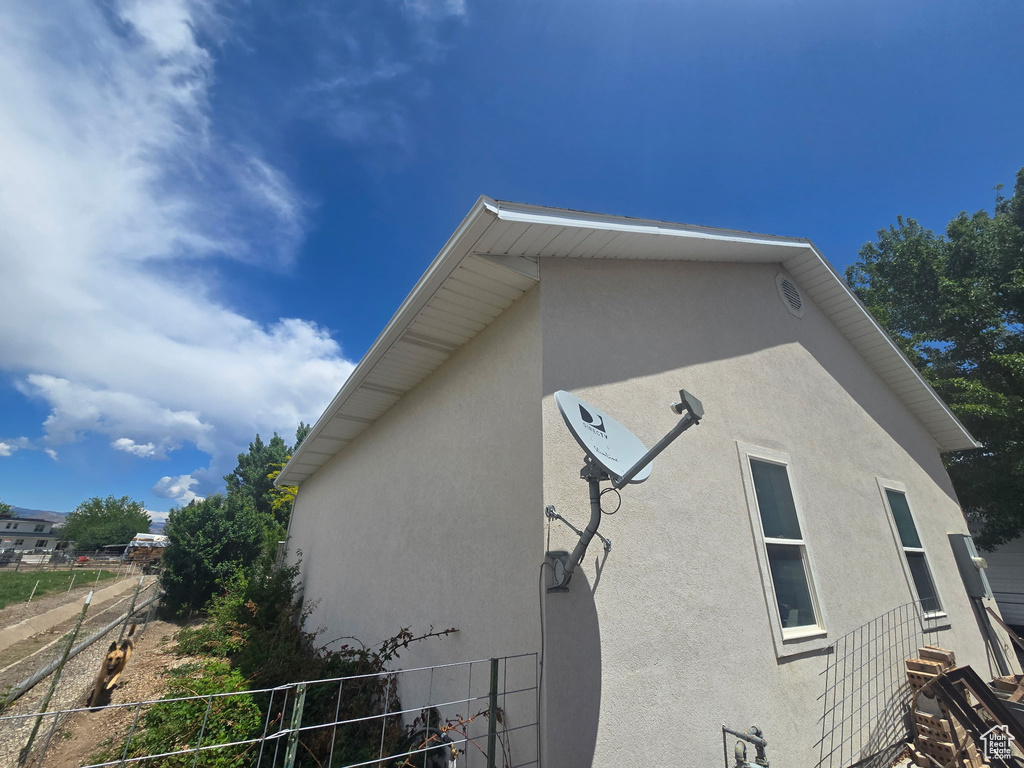View of property exterior featuring stucco siding