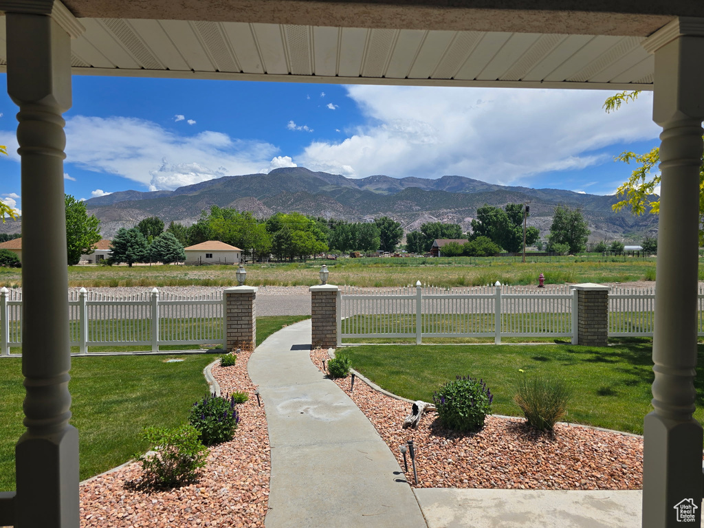 View of mountain background featuring rural landscape