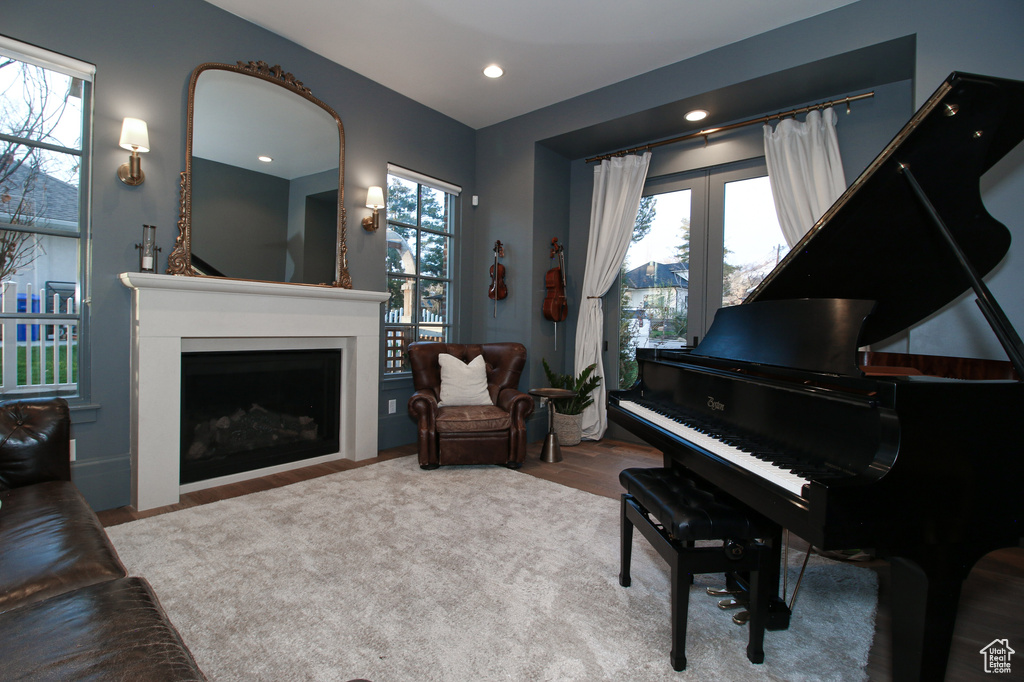 Living area with a fireplace and recessed lighting