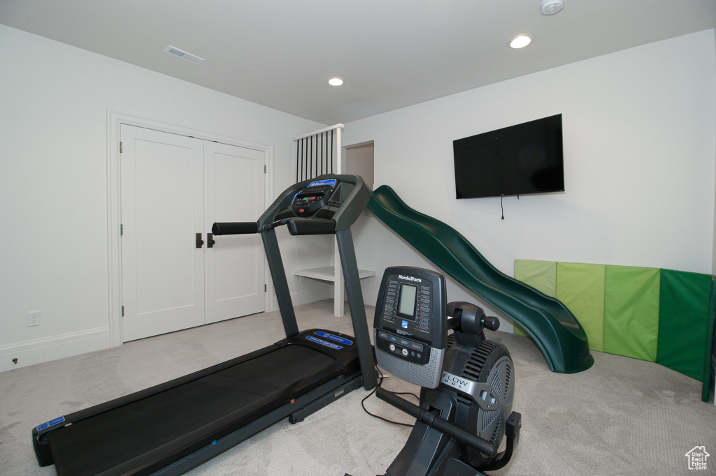 Workout area featuring recessed lighting, carpet, and visible vents
