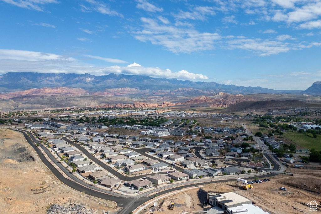 Aerial view of residential area featuring a mountain backdrop