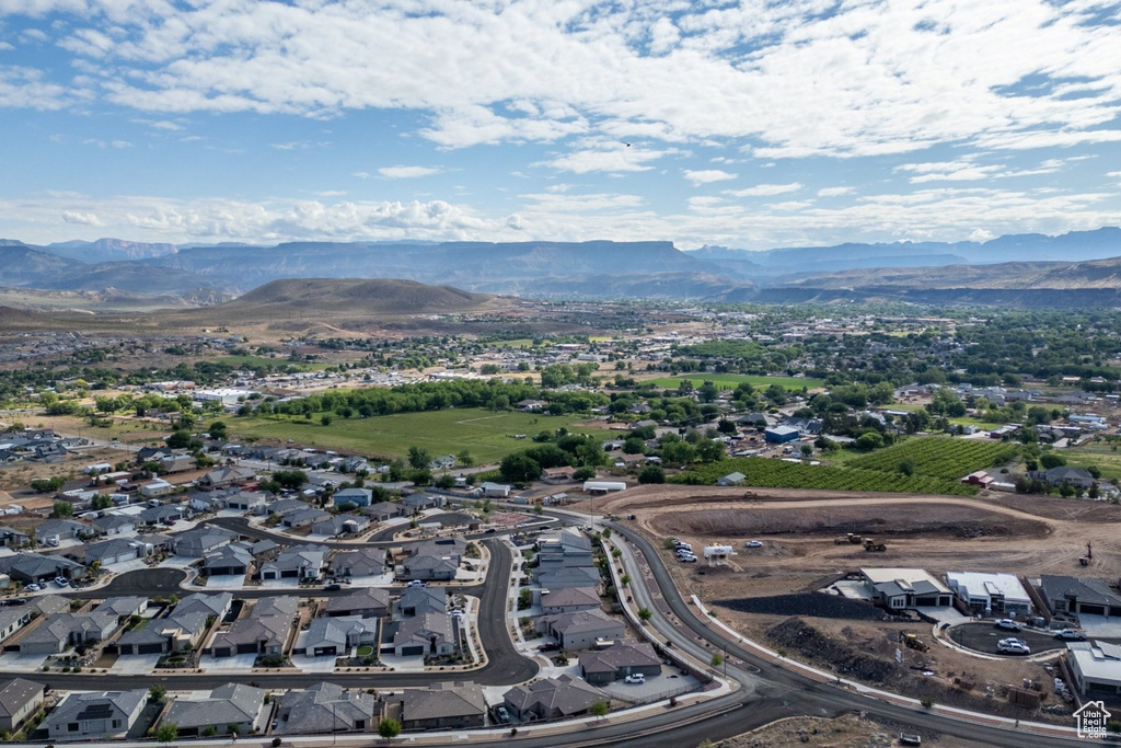 Aerial view of residential area featuring mountains