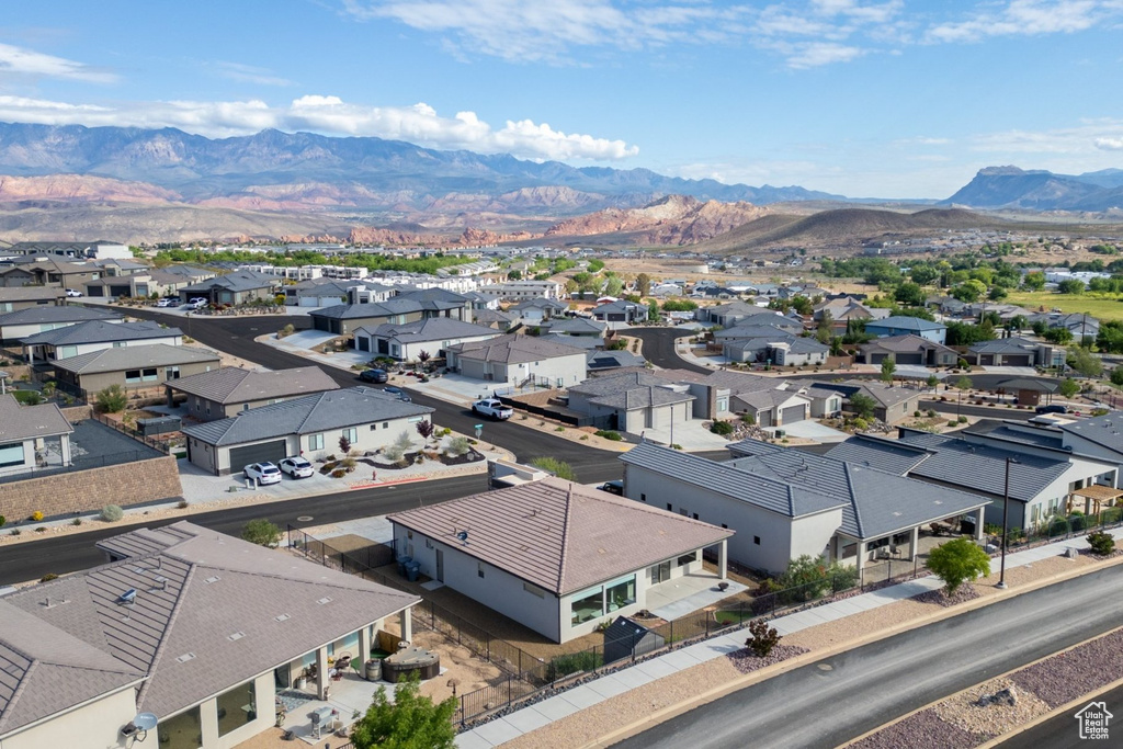 Aerial view of residential area featuring mountains