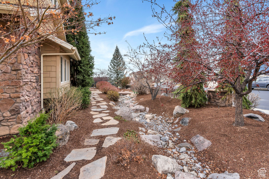 View of yard featuring fence