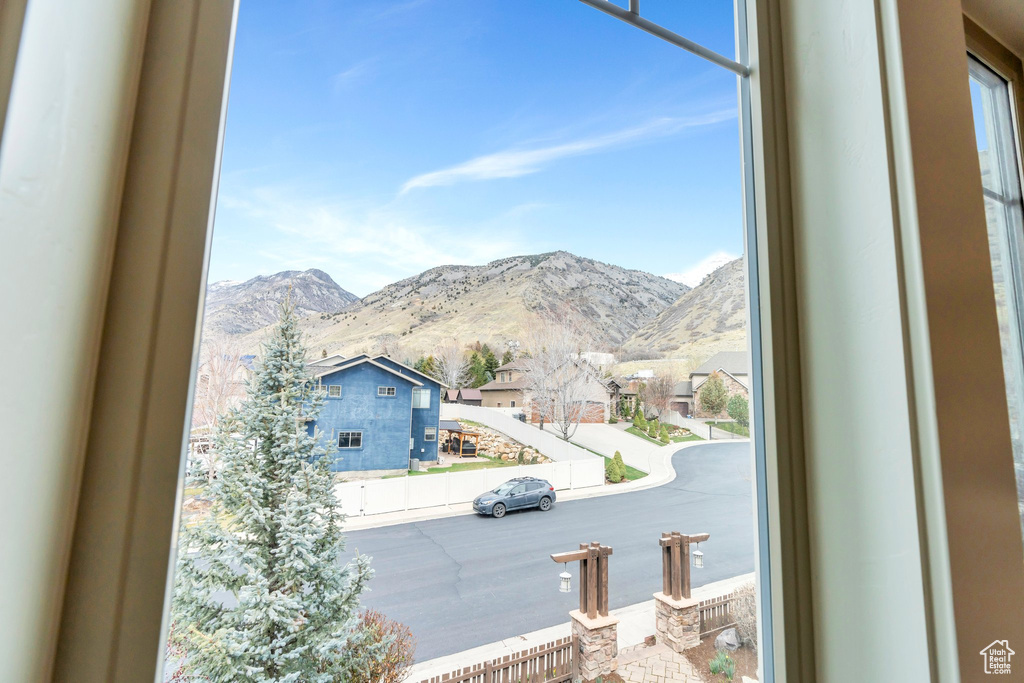 Property view of mountains featuring a residential view