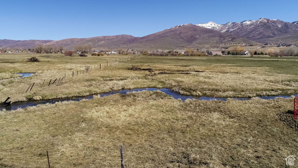 Mountain view with a water view and a rural view