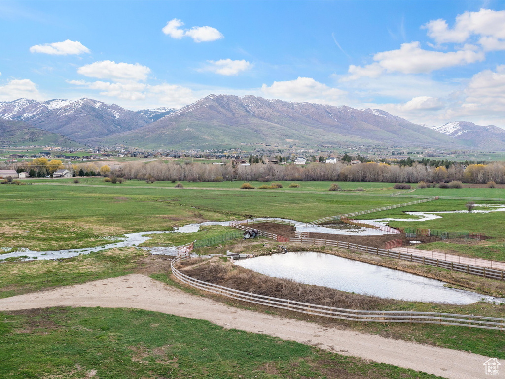 Mountain view featuring a water view and a rural view